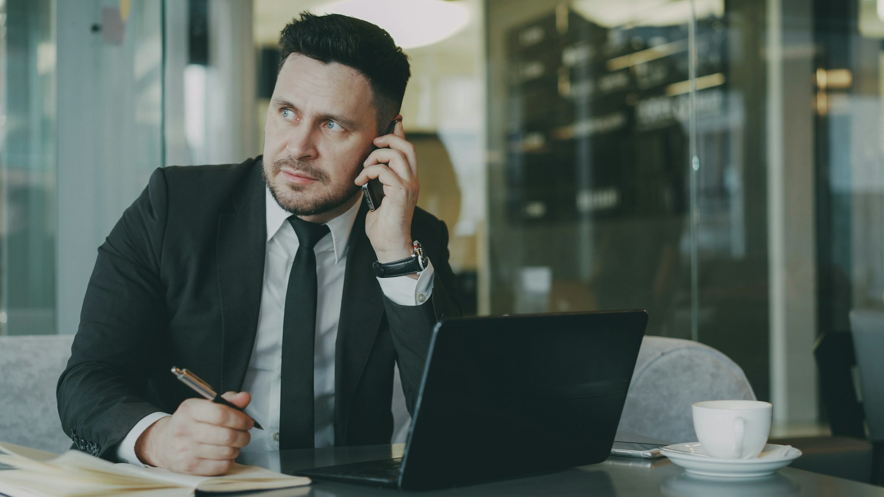 Business owner reviewing customer inquiries on a phone